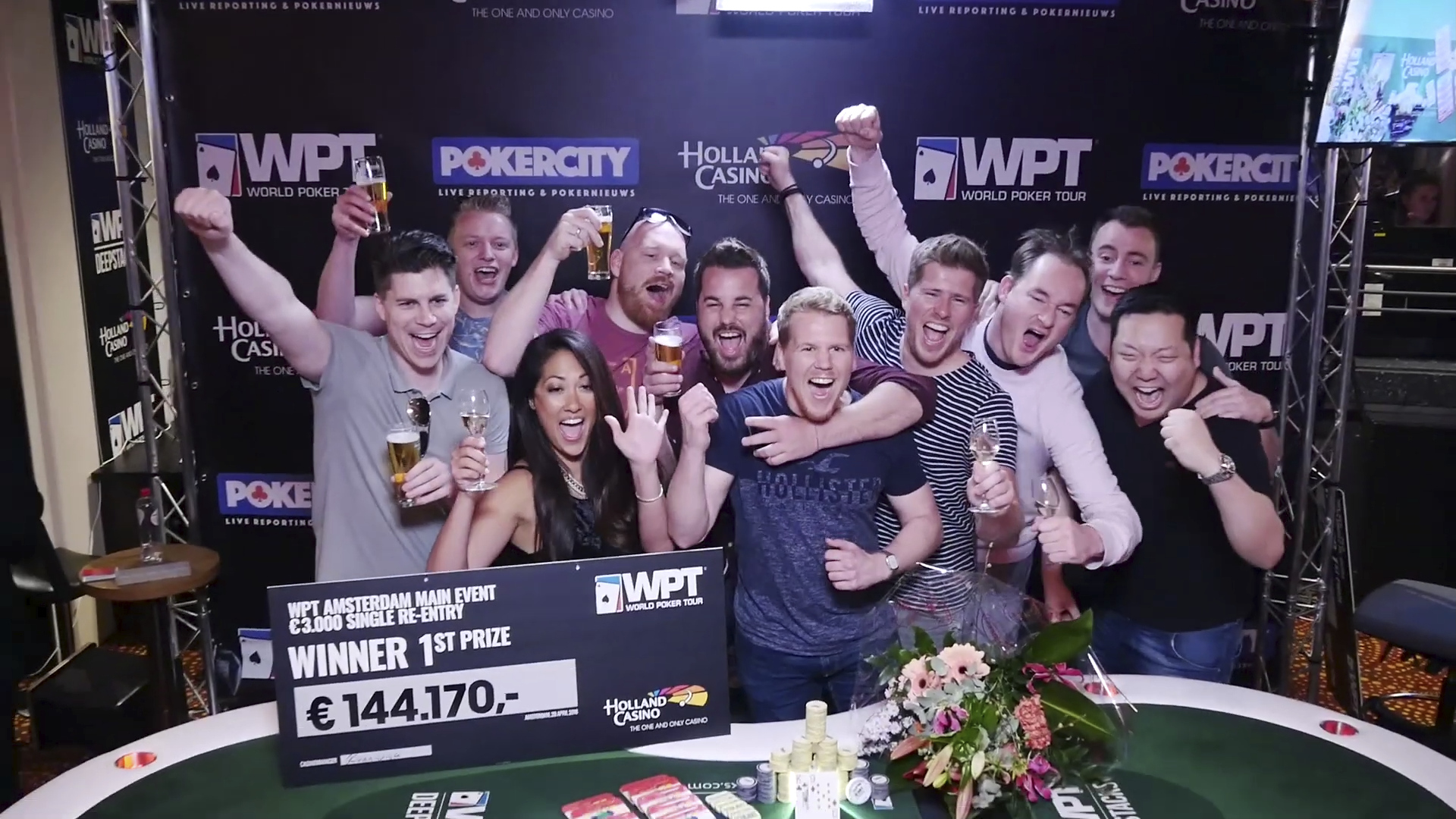 Players celebrating at a poker tournament